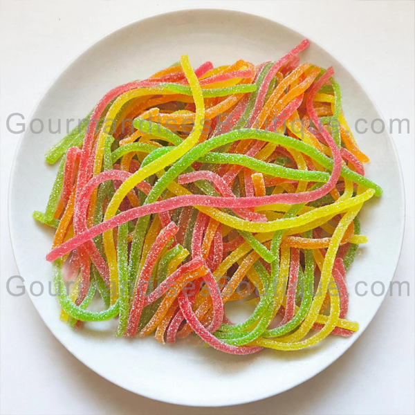 Bonbon Spaghetti/Lasso (Lacet) Multifruit Acidulé - Bonbon citrique fruité Haribo (acide) bon et agréable à manger.