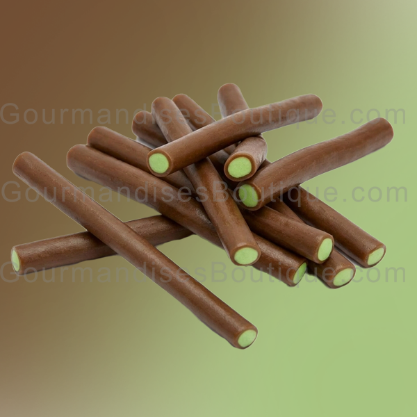 Délicieux Câble Cola Fourré Vanille - Confiserie lisse en forme de bâton.